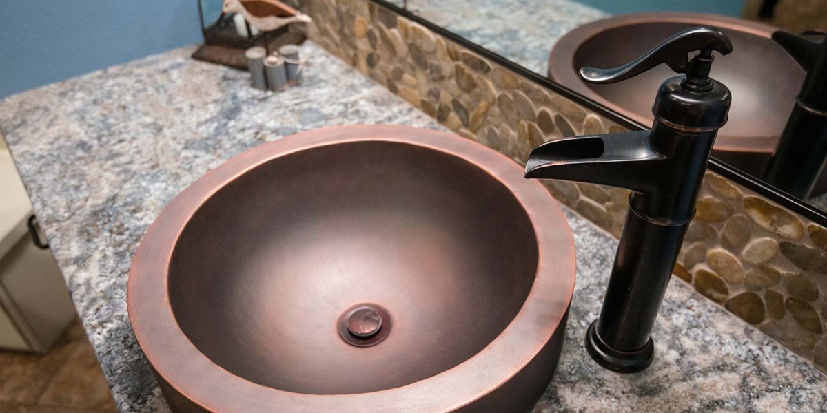 copper sink and faucet with granite counter top