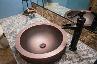 copper sink and faucet with granite counter top